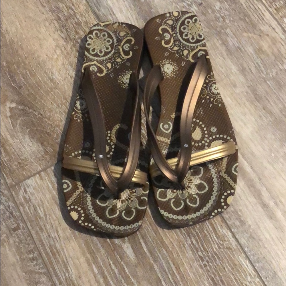 Aldo’s bronze and gold sandals